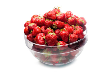Ripe strawberries in glass plate isolated on white