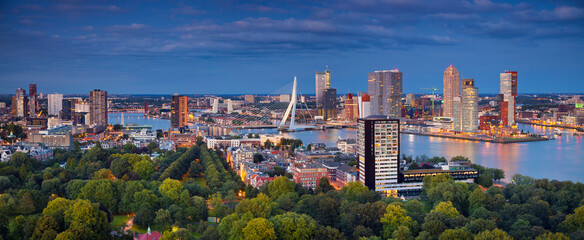 Panoramic image of Rotterdam, Netherlands during twilight blue hour.