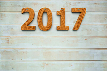Three-dimensional rendering of wooden 2017 on the wooden background, represents the new year 2017, 3D illustration