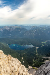 Fototapeta na wymiar View at lake Eibsee near Garmisch Partenkirchen, Bavaria, Germany, from above