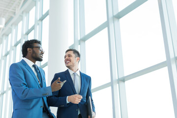 Young businessman in suit in office