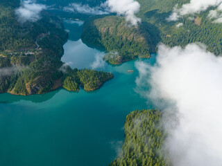 Rugged, forest-covered landscape surrounds Diablo Lake in North Cascades National Park. This mountainous region of northern Washington is absolutely beautiful and easily accessed during summer months.