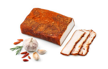 Big piece of raw homemade lard with paprika and spices, salted fat sliced into pieces isolated on white background. Natural product from organic farm, meat food, top view