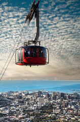 Fototapeta premium Table Mountain Cable Car - Breathtaking Rides, Panoramic Scenery, Aerial Adventures - fluffy clouds version