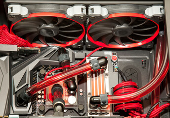 Inside computer water cooling  system in red background