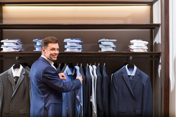 Smiling businessman in store