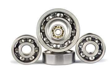 Five ball bearings on a white background