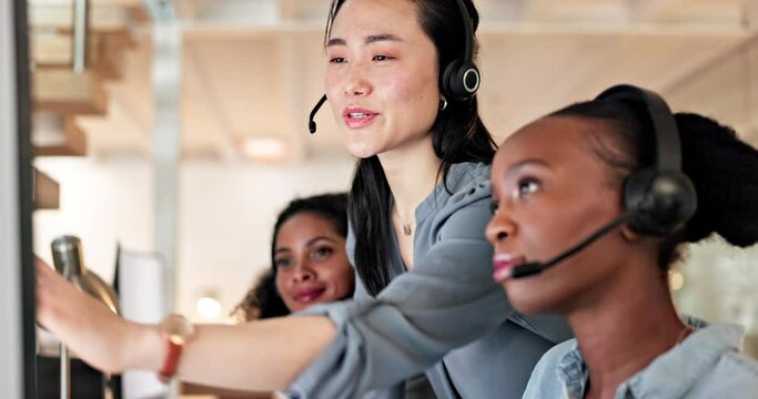 Asian woman, call center and coaching team in customer service, support or telemarketing at office. Female person, manager or coach training staff, consultant or agent for online advice at workplace