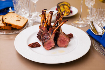 Lamb rack with limoncello glaze served on a plate