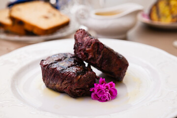 Filet mignon served on a plate in restaurant