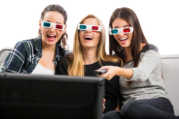 Girls watching 3D movies with popcorn