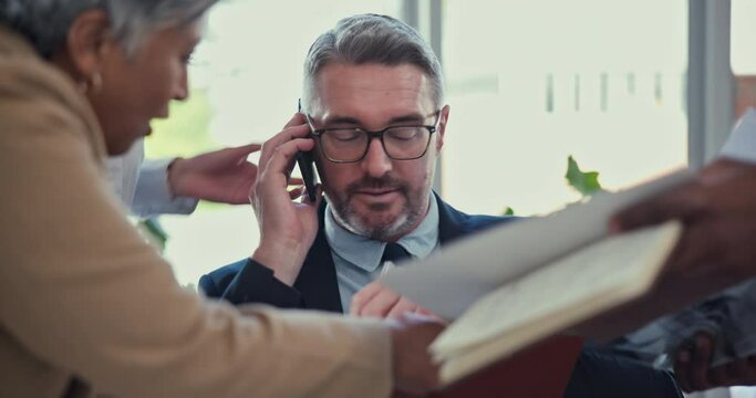Senior executive man, paperwork and time management, multitasking and productivity, boss with phone call. Decision, schedule and communication, chaos and people in office with challenge and workflow