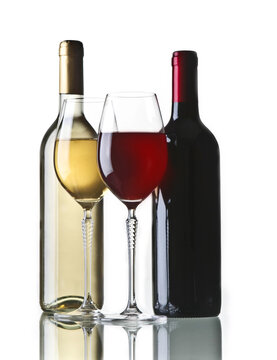 Bottle of red  and white wine with two glasses on white background. Perfect for bar and restaurant