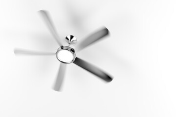 Spinning ceiling fan in the room