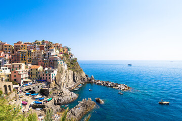 Fototapeta na wymiar Spectacular panorama of Manarola Town in Cinque Terre during a sunny day