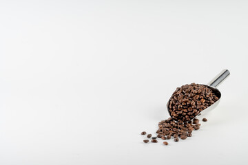 Coffee beans isolated on white background with copy space for text. Coffee background or texture concept.