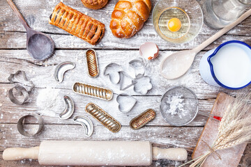 Fototapeta na wymiar Delicious Christmas holiday baking background with ingredients and utensils
