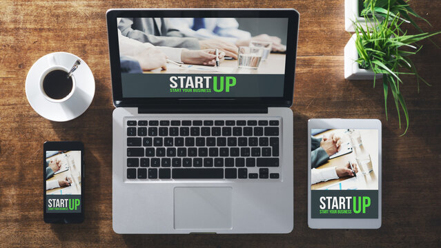 Start up corporate identity website on laptop, digital tablet and smart phone, business desktop