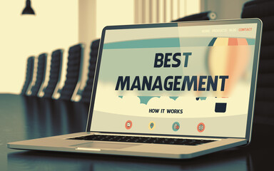Mobile Computer Screen with Best Management Concept on Landing Page. Closeup View. Modern Meeting Hall Background. Toned Image. Blurred Background. 3D Rendering.