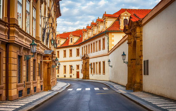 Deserted road at vintage street among old houses in old town Prague, Czech Republic.