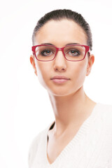 Young attractive model wearing fashion red glasses and posing on white background