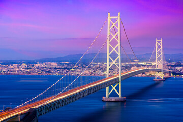 Obraz premium Akashi Kaikyo Bridge spanning the Seto Inland Sea from Awaji Island to Kobe, Japan.