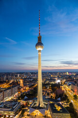 Fototapeta premium Panoramic view over Berlin at dusk from roof of the Hotel Park Inn Berlin.