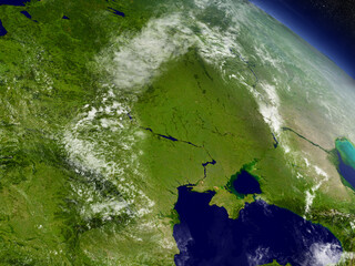 Ukraine with surrounding region as seen from Earth's orbit in space. 3D illustration with highly detailed planet surface and clouds in the atmosphere. Elements of this image furnished by NASA.