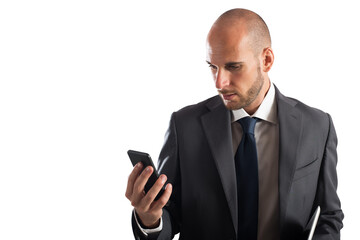 Businessman looks at the screen of his cellphone