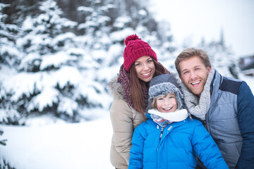 Fototapeta premium Family at winter forest