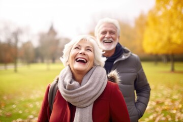 Happy Senior couple having fun together at the park