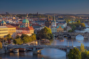 Image of Prague, capital city of Czech Republic and Charles Bridge, during sunset.
