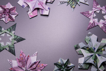 snowflake origami made of banknotes euro. Handmade