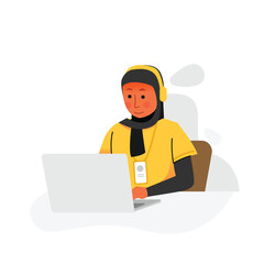 Muslim woman in shirts working with focus in front of laptop while listening to music using headphones