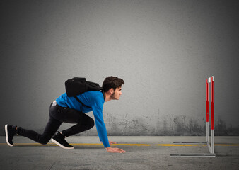 Teenager boy with backpack ready to race