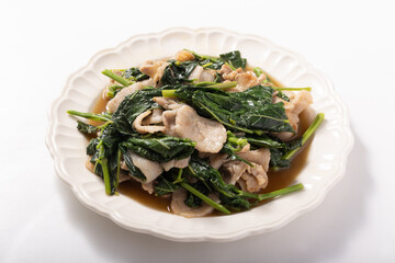 モロヘイヤと豚肉のにんにく炒め