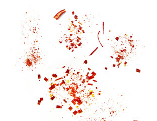 Red chilli flakes, Hot crushed red cayenne pepper flakes scattered over white background. dried...