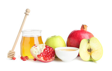 Fresh apples, pomegranates and honey on white background. Rosh hashanah (Jewish New Year) celebration