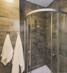 Bathroom interior with glass shower cabin, interior design