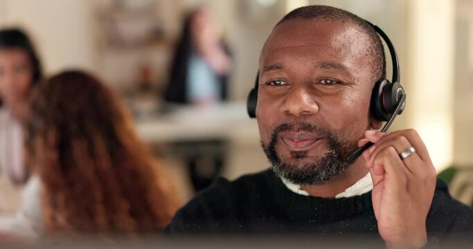Face, call center and a black man talking with a headset for customer service, advise or crm. Happy person working late at office for telecom, telemarketing or technical support at help desk