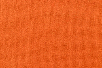Orange cotton fabric texture background, seamless pattern of natural textile.