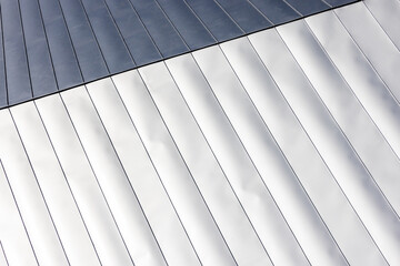 Shiny new roof made of stainless steel, abstract architecture