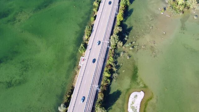Rapperswil, Switzerland: Aerial drone footage of the bridge over Lake Zurich toward the rapperswil-Jona city in canton Saint Gallen. 