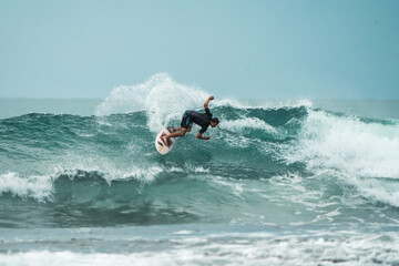 Indonesian Surfing Adventure: Thrilling Ride on Majestic Blue Waves in the Mentawai