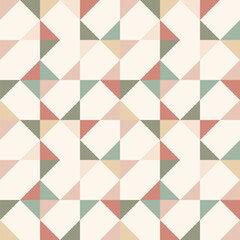 Seamless pattern with random triangle and square shapes. Repeatable geometric tile pattern in muted pastel colors. For background, wallpaper, floor tile, textile, etc.