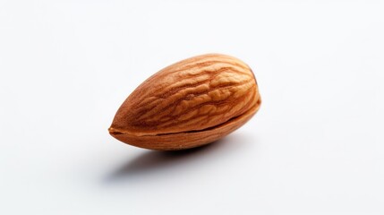 a single almond on a white background, created by Generative AI