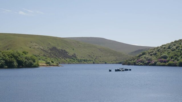 Panoramic View of Meldon Reservoir, With Platform and Bois on Water and Lush Green Hills in Distance, Dartmoor, England