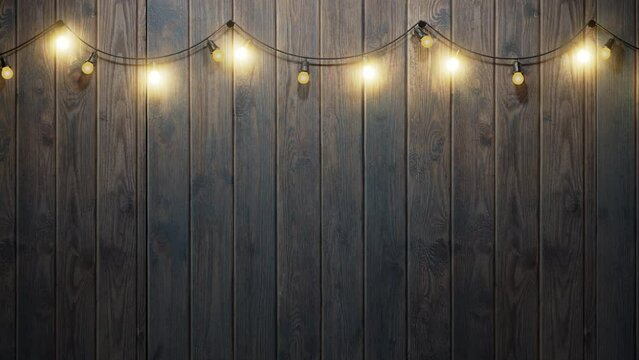 Flashing light bulbs on a wooden background, free space for your task or message.