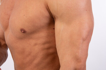 Fototapeta premium Young attractive sportsman with a beautiful body.