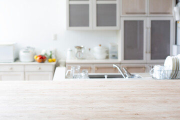 白木テーブルがあるキッチンの背景素材